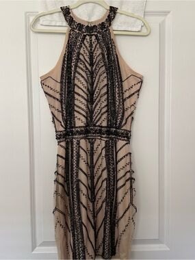 Minuet Nude Mini Dress with Black Beading